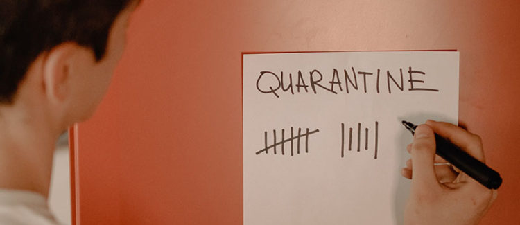 Man marking off quarantine days