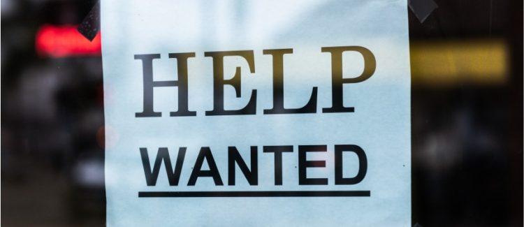 Help Wanted Sign in Window