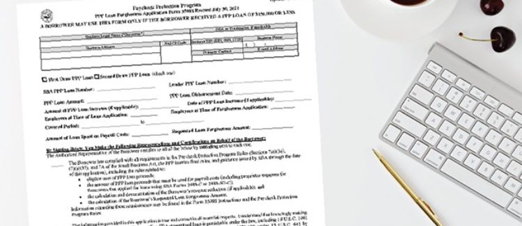 PPP Loan Forgiveness Paper Application on Desk