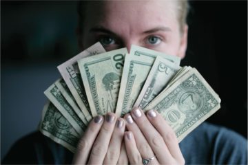 Woman holding cash