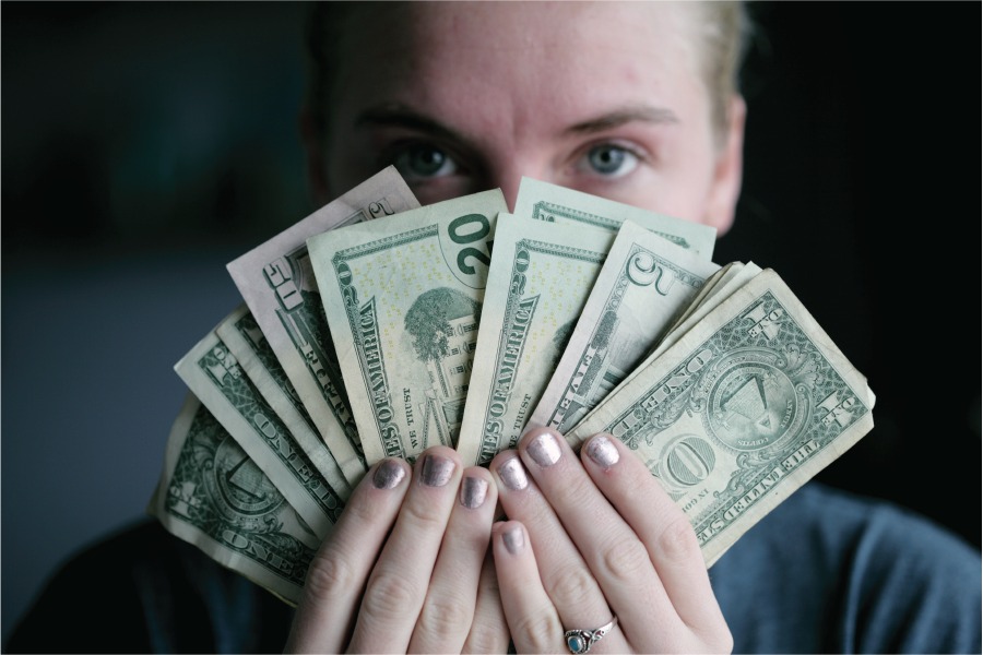 Woman holding cash